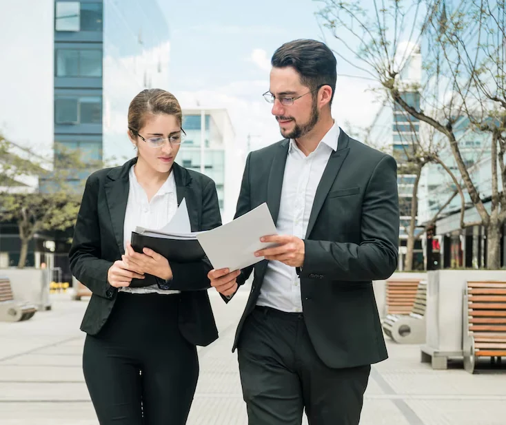 Attorneys reviewing corporate documents